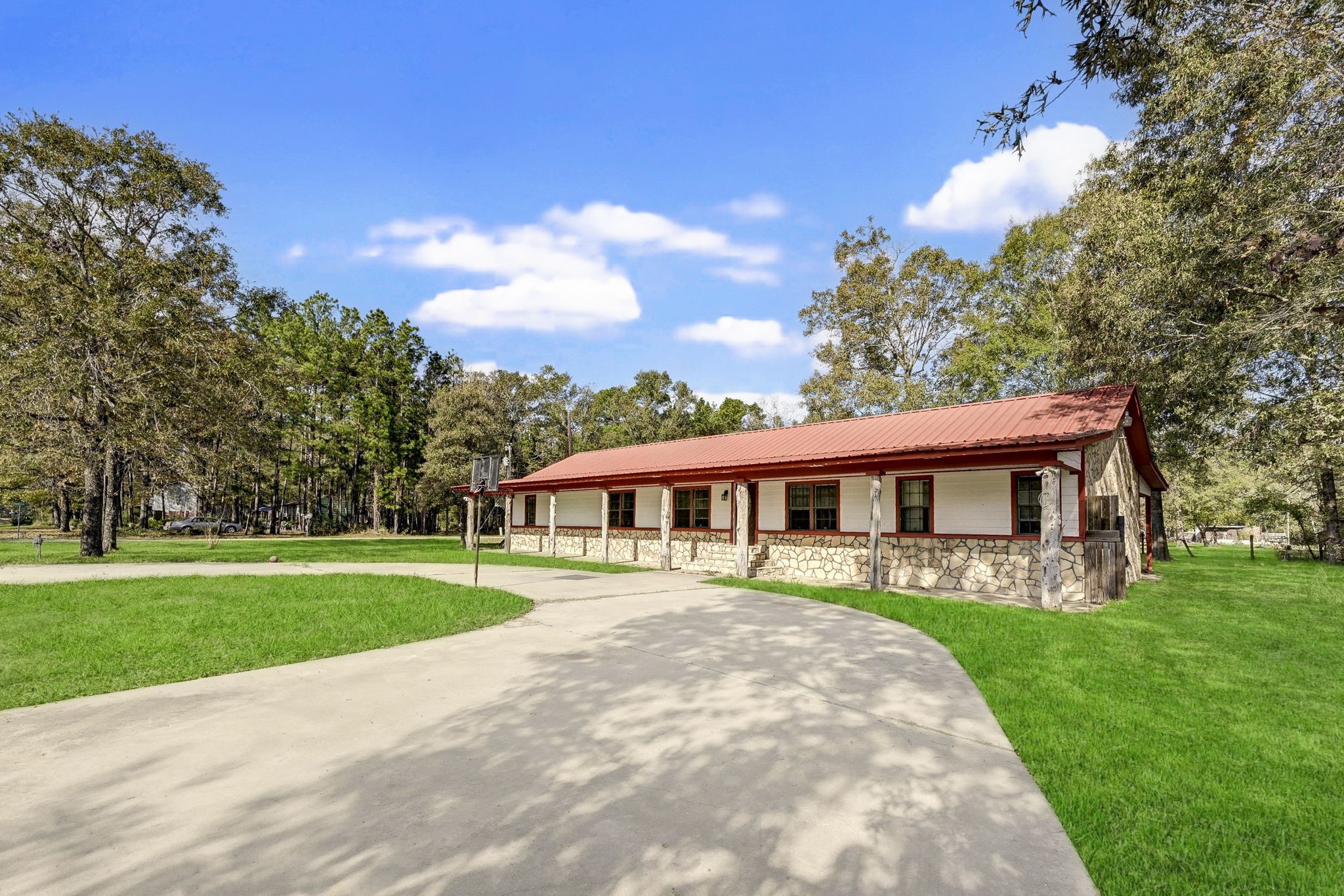858 Big Hawg Road Trinity, TX 75862 - Photo 5 of 47 a view of a house with a yard