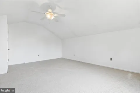 a view of a room with a fan