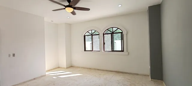 a bathroom with a sink vanity and toilet