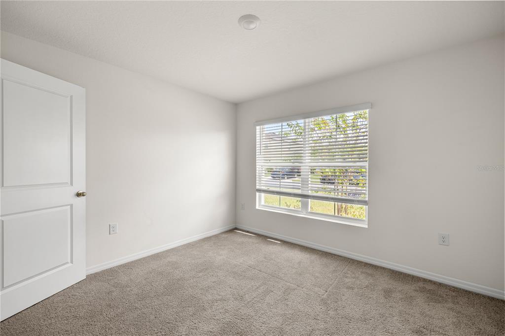 6563 Southeast 1st Loop Ocala, FL 34472 - Photo 23 of 24 a view of an empty room with a window