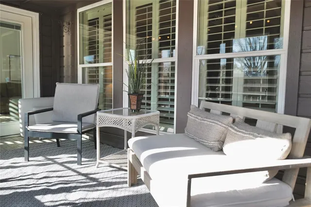 a bedroom with a bed and lamp