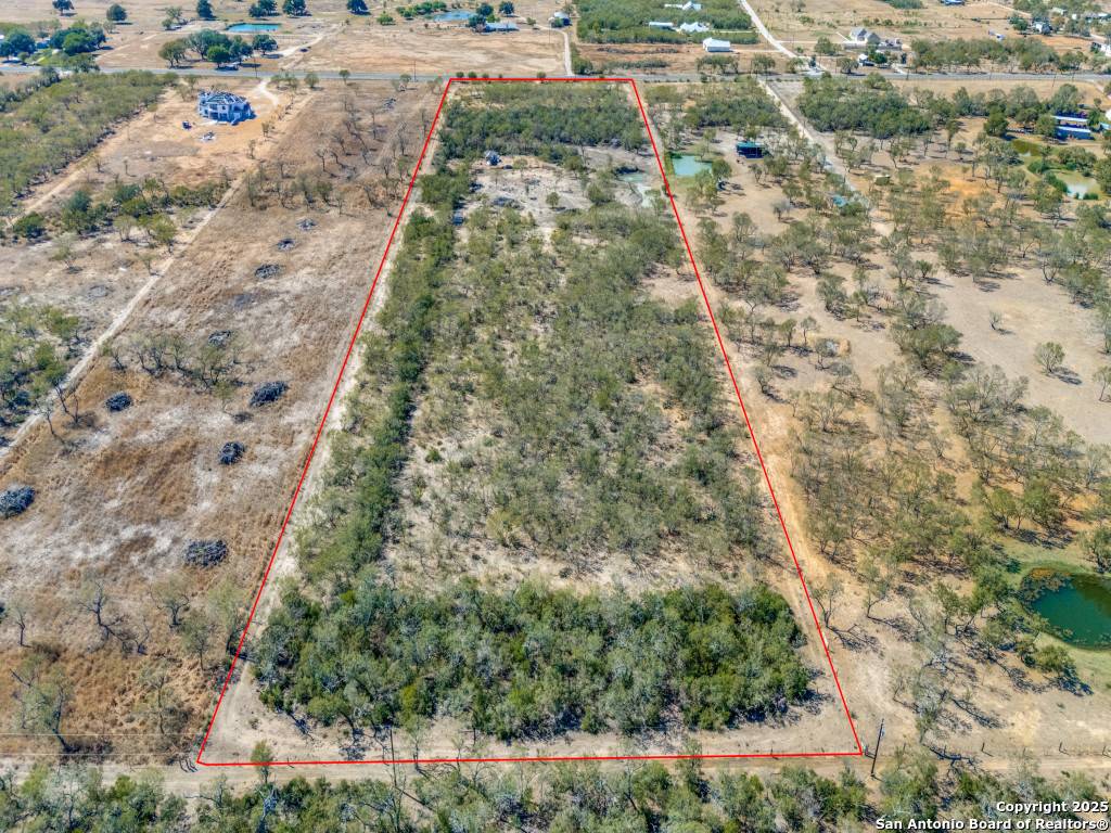 0 Fm 1346 St. Hedwig, TX 78152 - Photo 4 of 17 a aerial view of a yard
