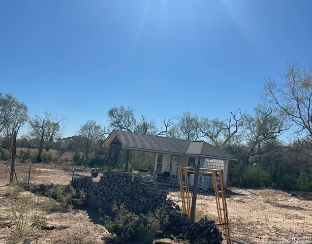 a view of house with a outdoor space