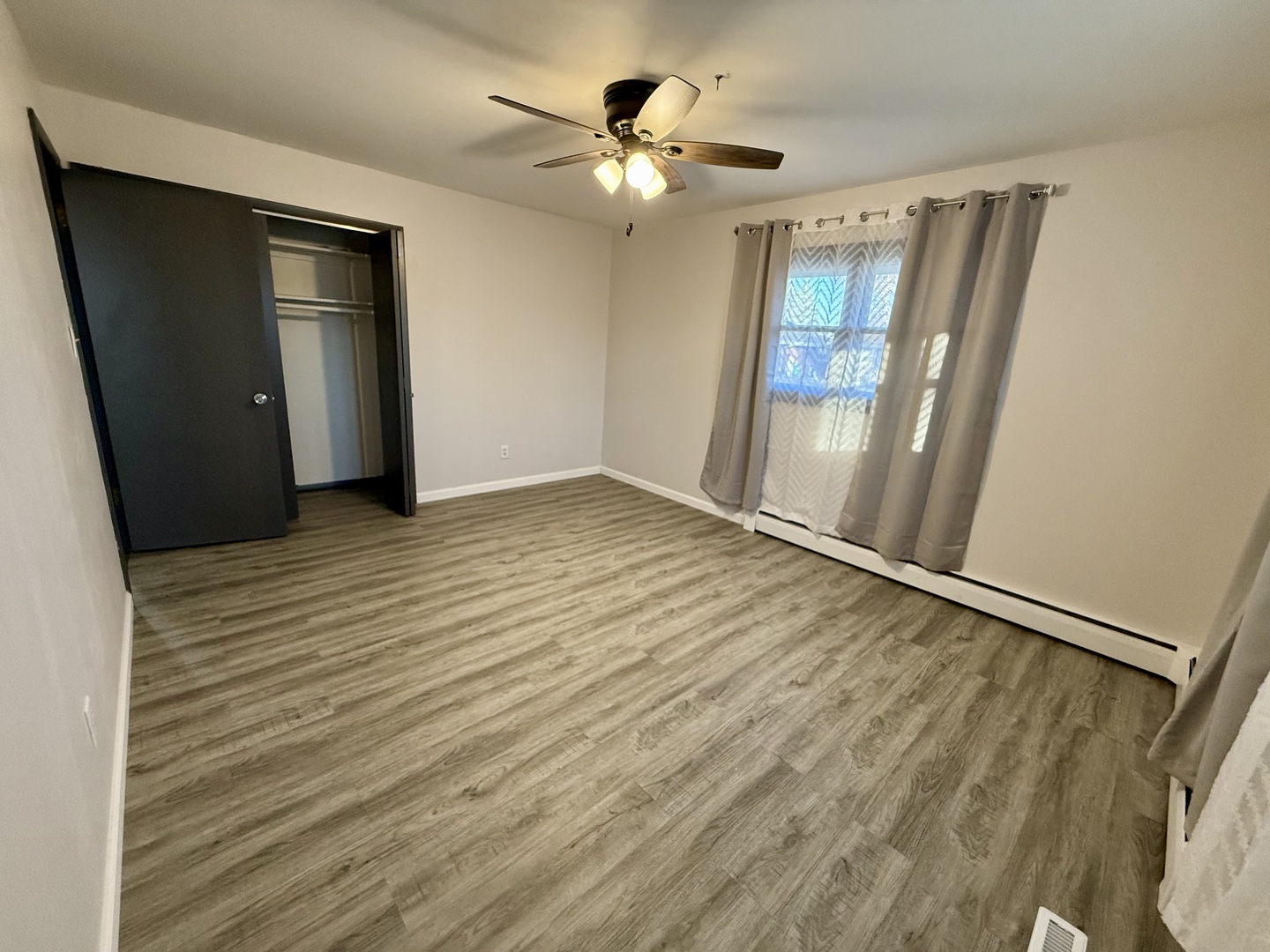 1357 Jeffrey Drive Rantoul, IL 61866 - Photo 11 of 21 a view of an empty room with a window