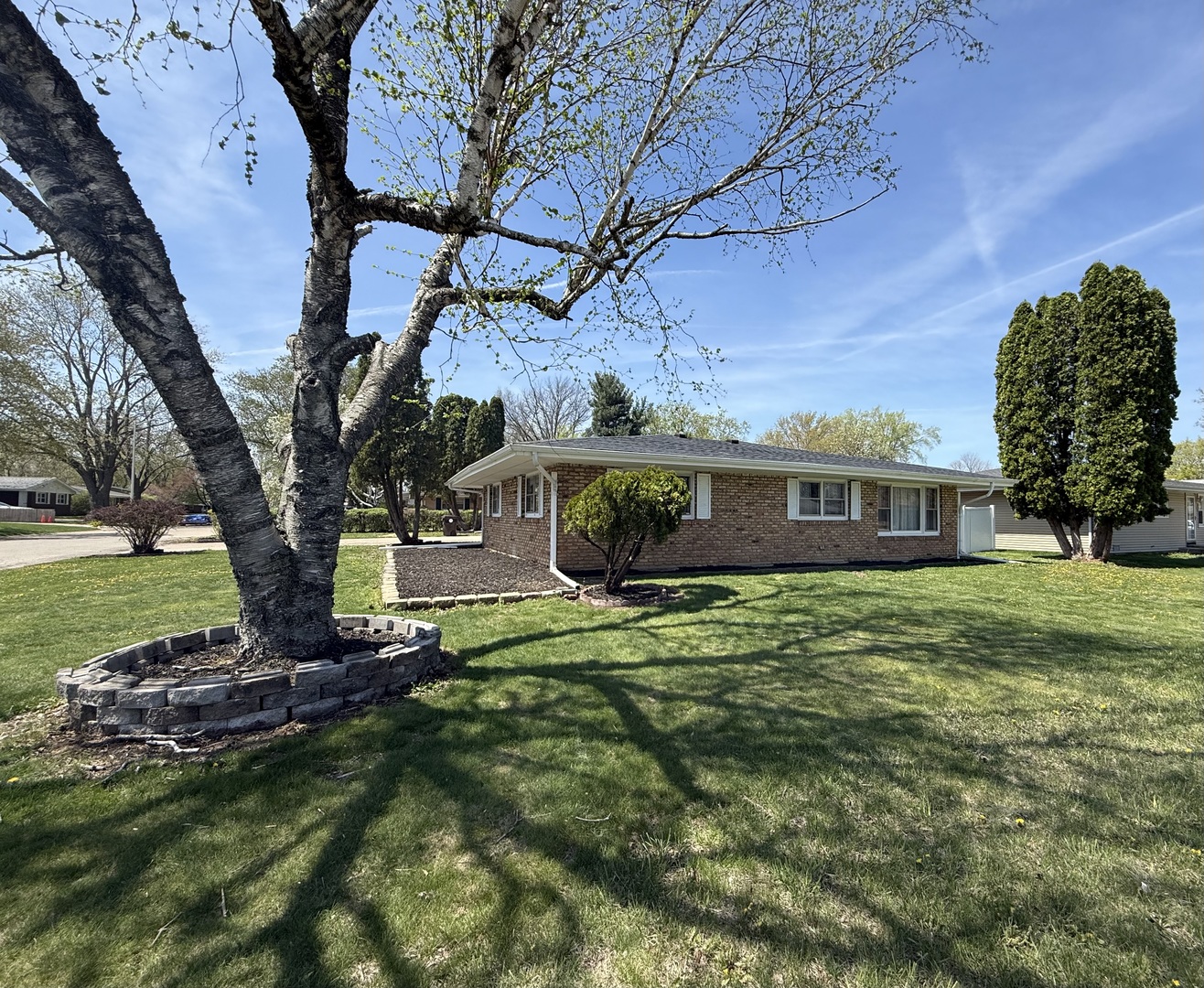 1357 Jeffrey Drive Rantoul, IL 61866 - Photo 19 of 21 a view of a house with a yard