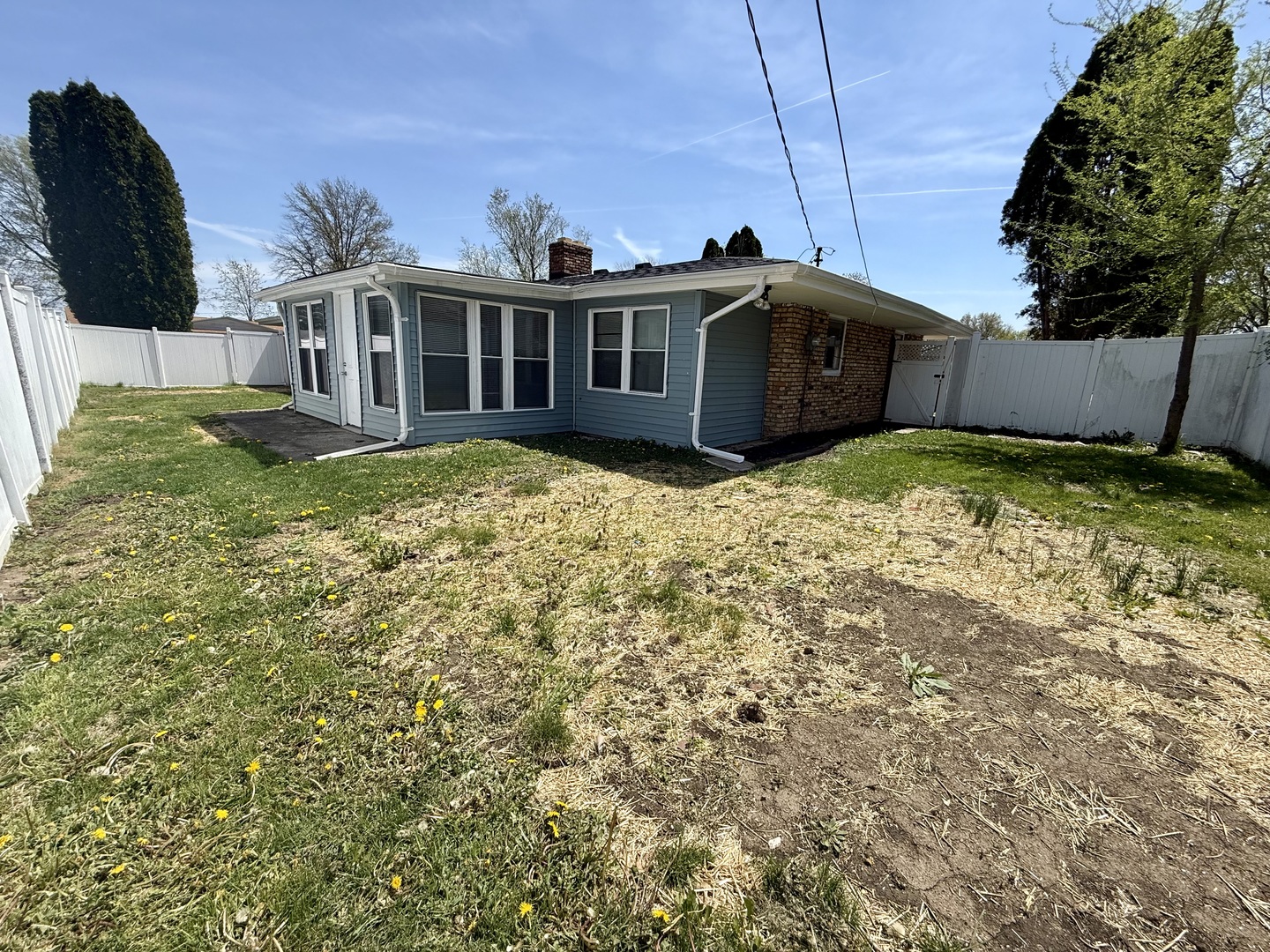 1357 Jeffrey Drive Rantoul, IL 61866 - Photo 21 of 21 a view of a house with a backyard