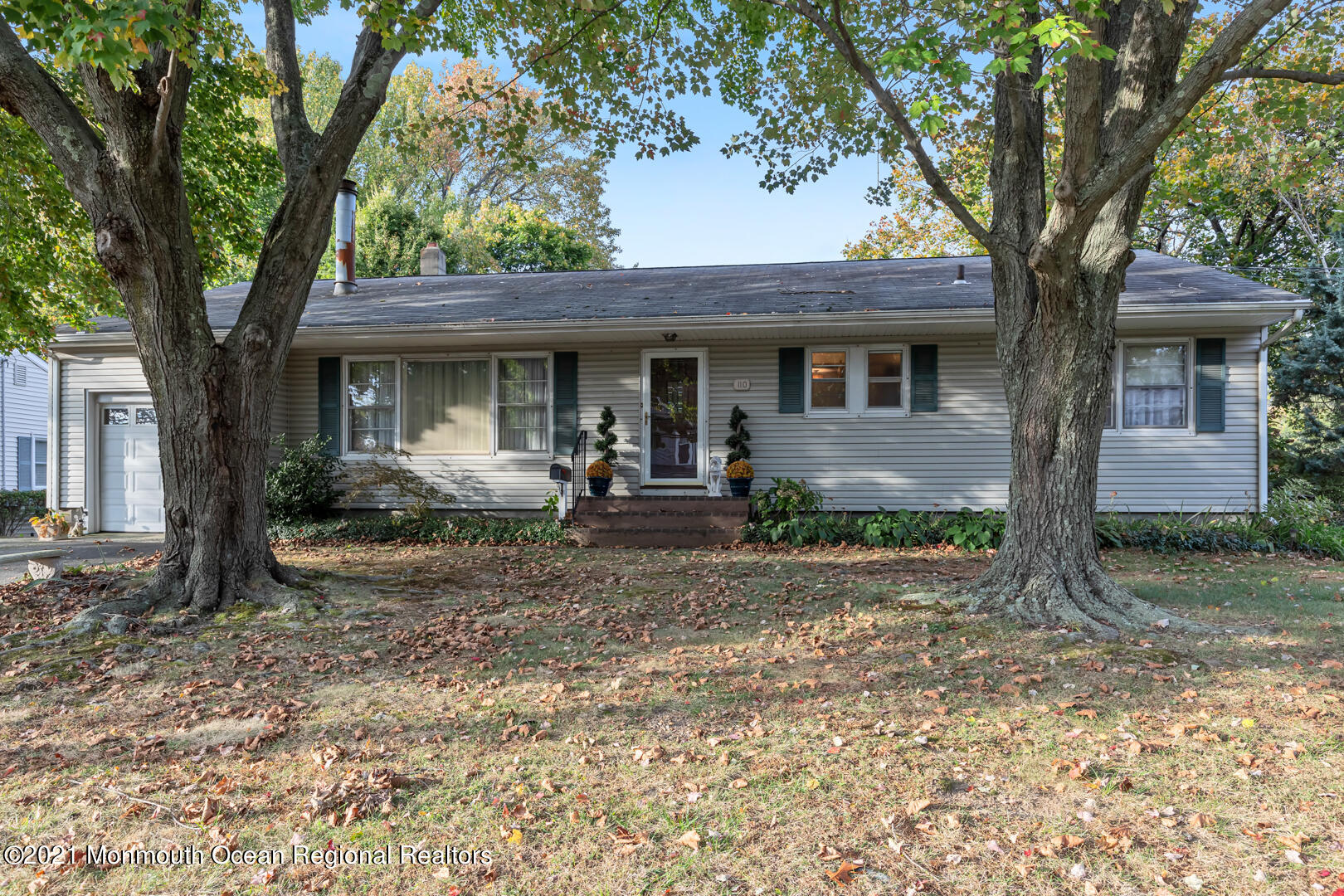 110 Bethany Road Hazlet, NJ 07730 - Photo 1 of 22 a front view of a house with garden