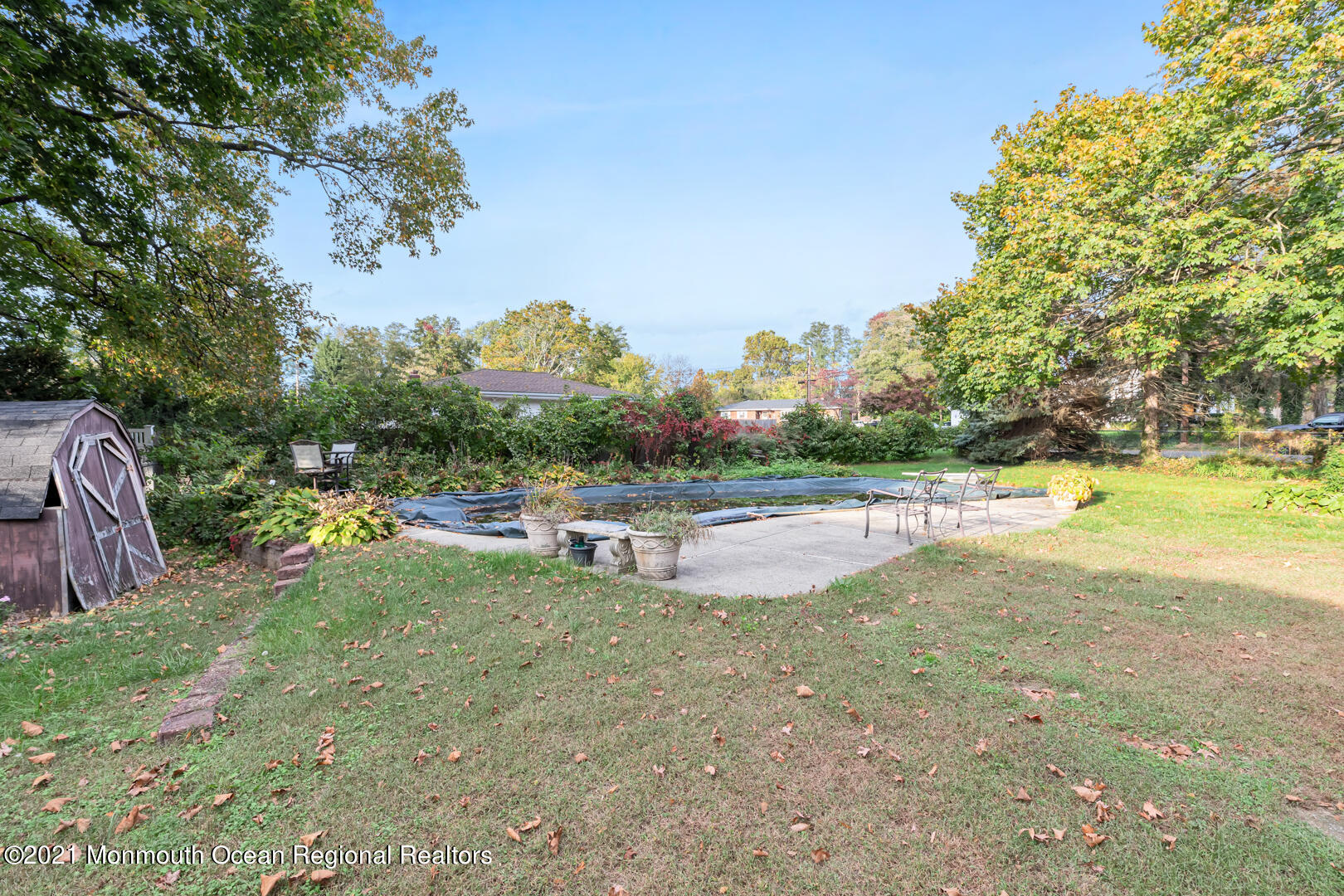 110 Bethany Road Hazlet, NJ 07730 - Photo 22 of 22 a view of a swimming pool with an outdoor seating and a yard