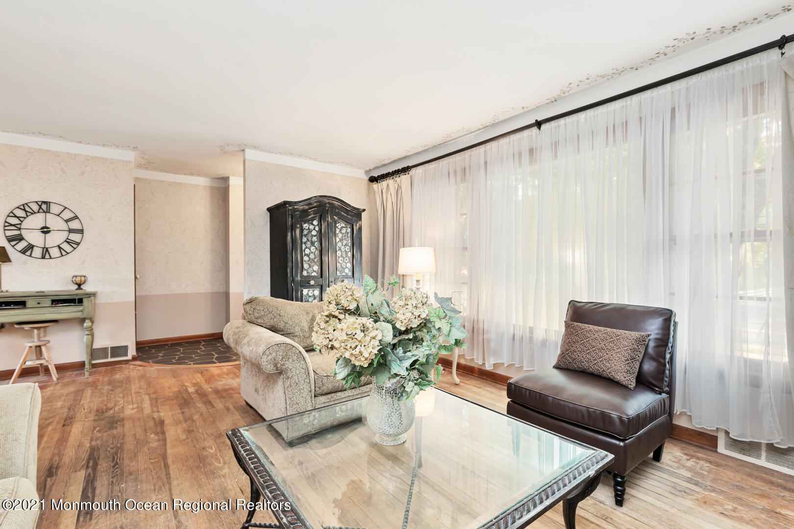 110 Bethany Road Hazlet, NJ 07730 - Photo 4 of 22 a living room with furniture and a large window