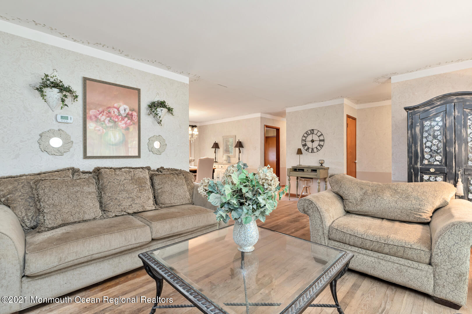 110 Bethany Road Hazlet, NJ 07730 - Photo 5 of 22 a living room with furniture or couch and a dining table