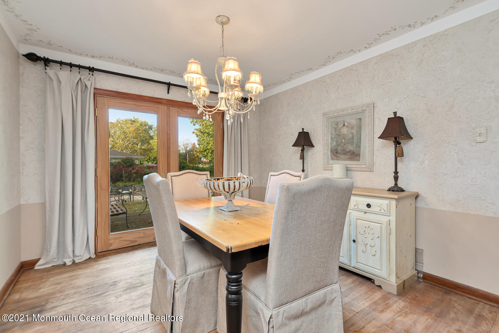 110 Bethany Road Hazlet, NJ 07730 - Photo 7 of 22 a dining room with furniture a chandelier and window