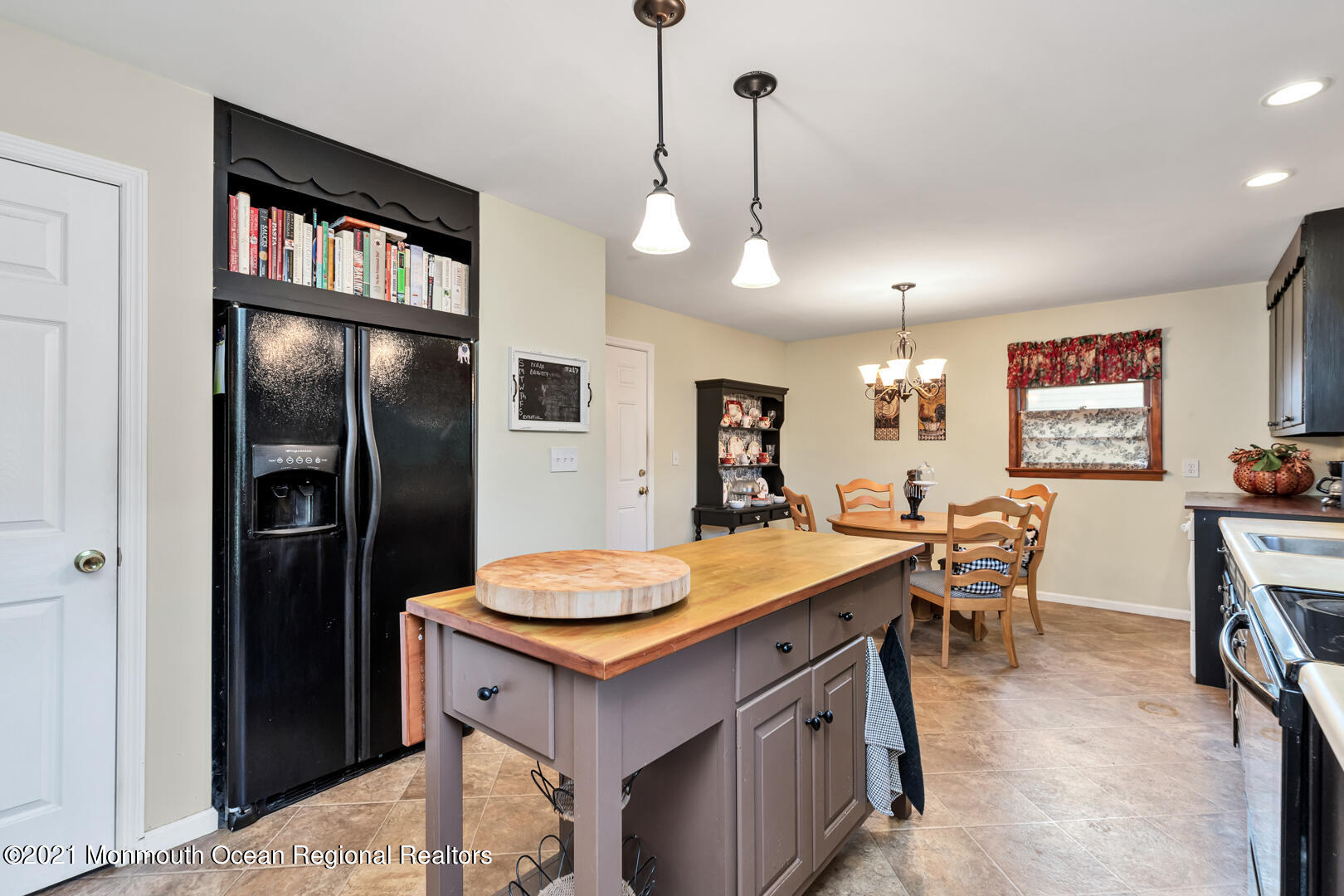 110 Bethany Road Hazlet, NJ 07730 - Photo 9 of 22 a kitchen that has a lot of cabinets a sink and a refrigerator