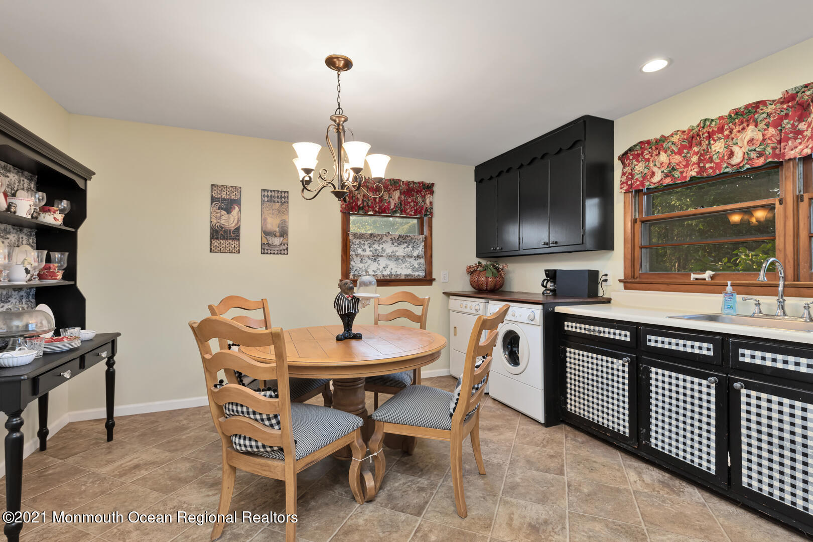 110 Bethany Road Hazlet, NJ 07730 - Photo 10 of 22 a view of a dining room with furniture wooden floor and chandelier