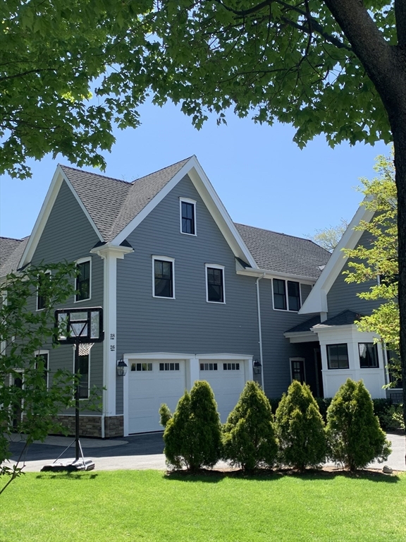 a house view with a garden space