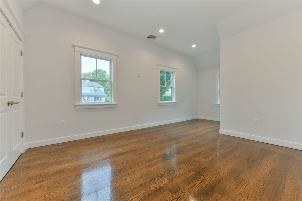 28 Sumner Street, Unit 28 Newton, MA 02459 - Photo 16 of 32 a view of an empty room with a window