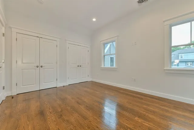 a bathroom with a shower sink double and mirror
