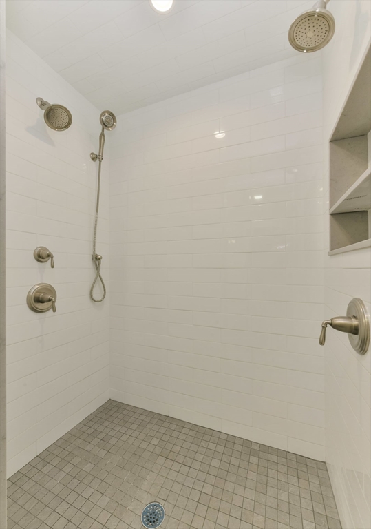 28 Sumner Street, Unit 28 Newton, MA 02459 - Photo 25 of 32 a bathroom with a shower