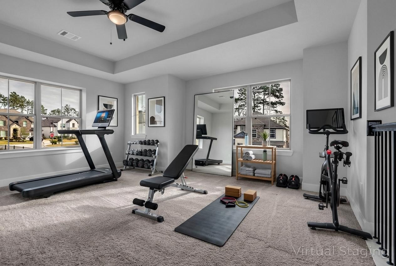 215 Flower Moon Court Conroe, TX 77318 - Photo 28 of 44 a view of a room with gym equipment