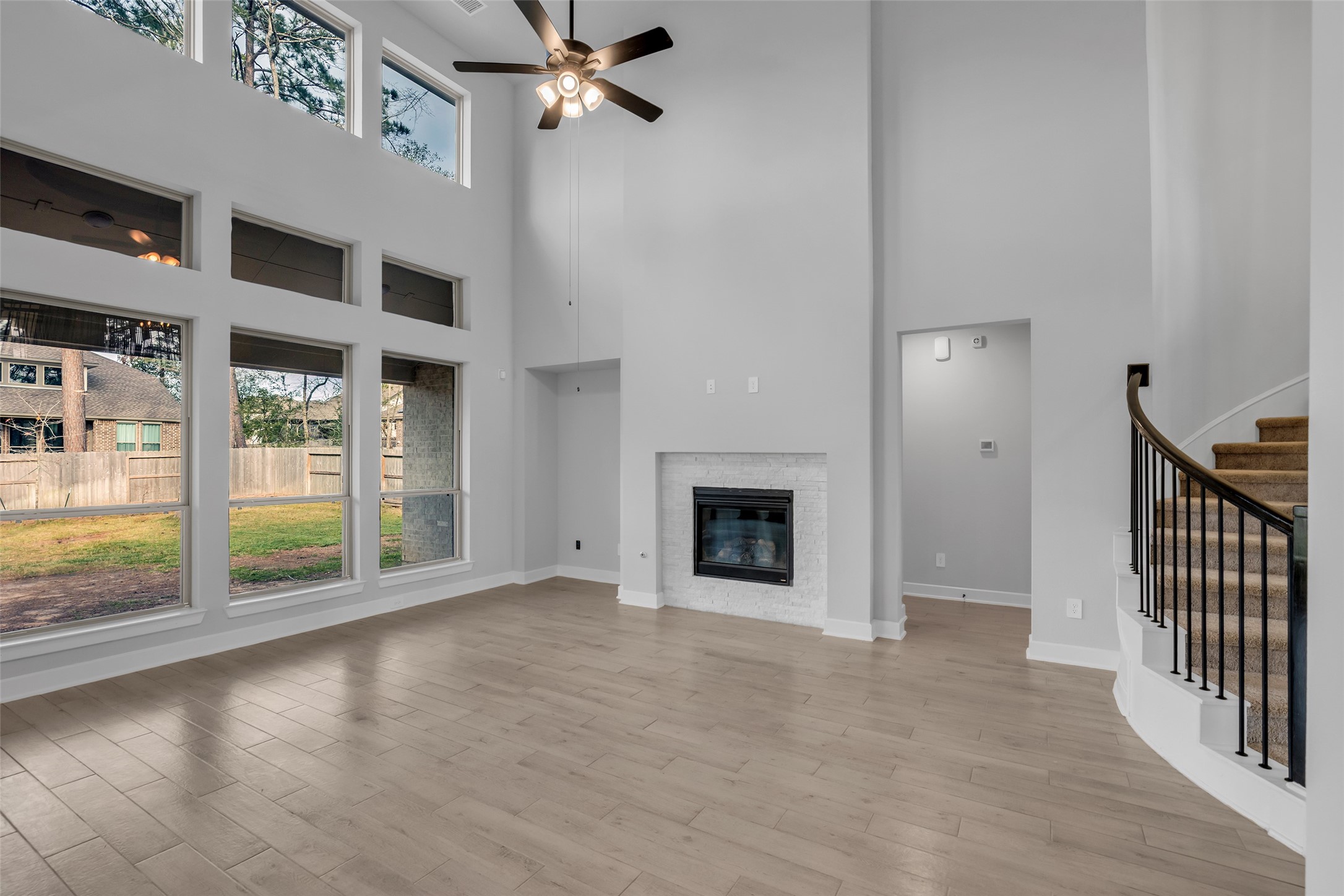 215 Flower Moon Court Conroe, TX 77318 - Photo 4 of 44 a view of an empty room with glass door