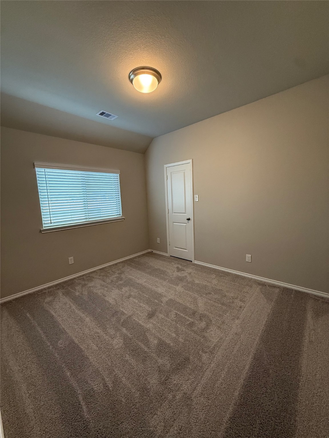 31965 Retama Rnch Drive Spring, TX 77386 - Photo 13 of 18 a view of an empty room with a window