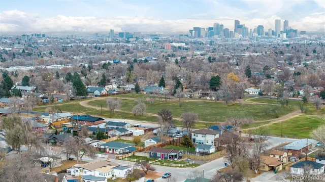 a view of a city with a lake