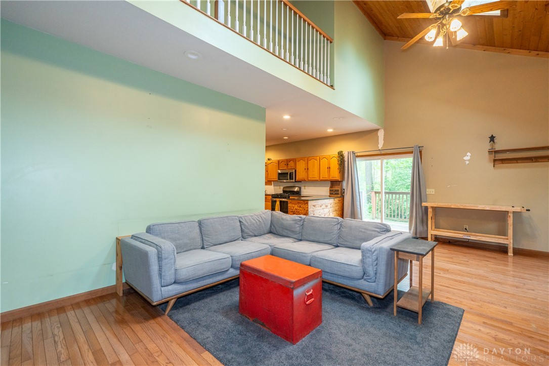 10584 New Biddinger Road Harrison, OH 45030 - Photo 11 of 61 This airy living space features soaring ceilings and gleaming hardwood floors.