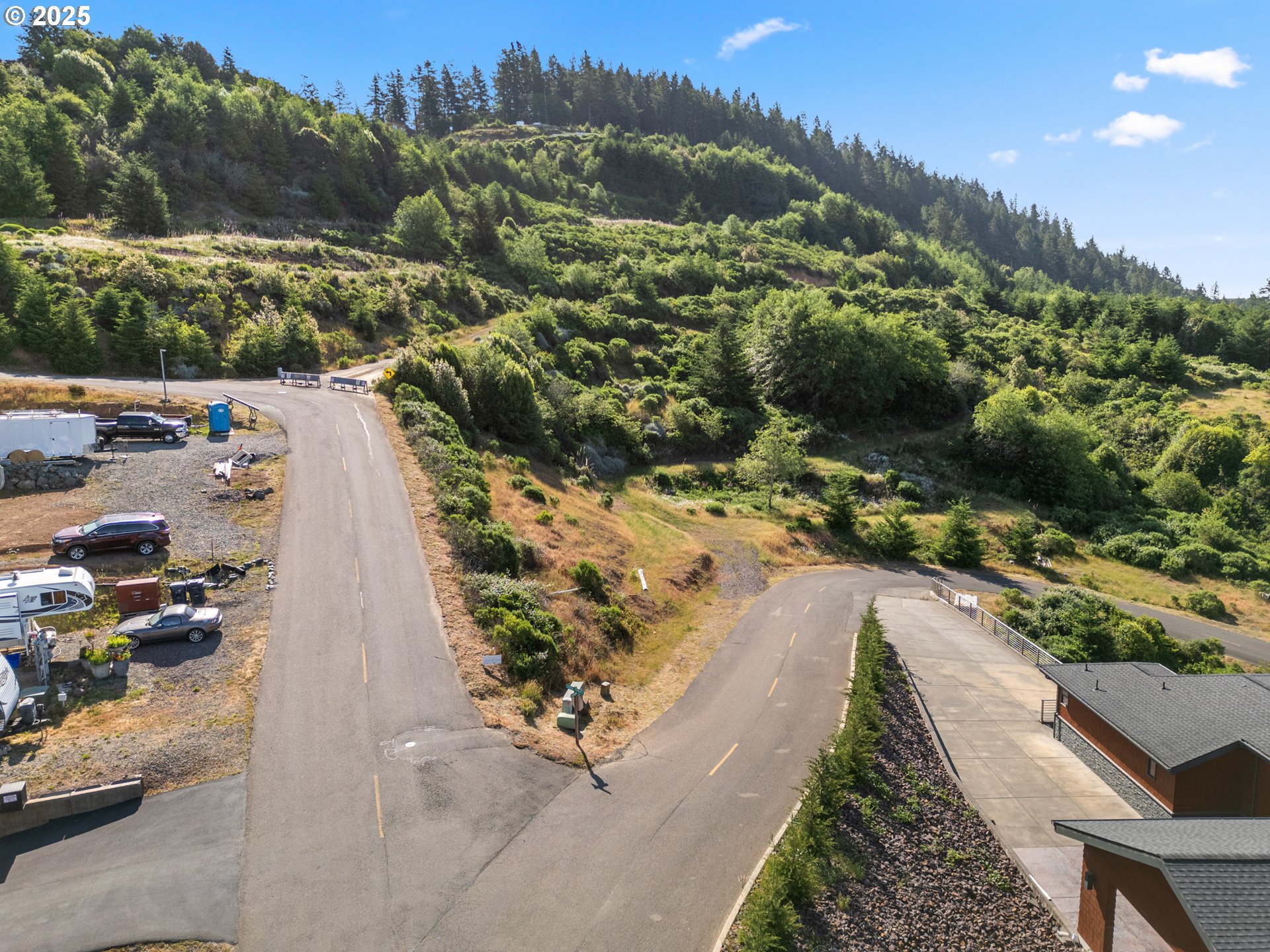 Crown Terrace Loop, Unit 2 Brookings, OR 97415 - Photo 6 of 23 a view of a city with flower plants
