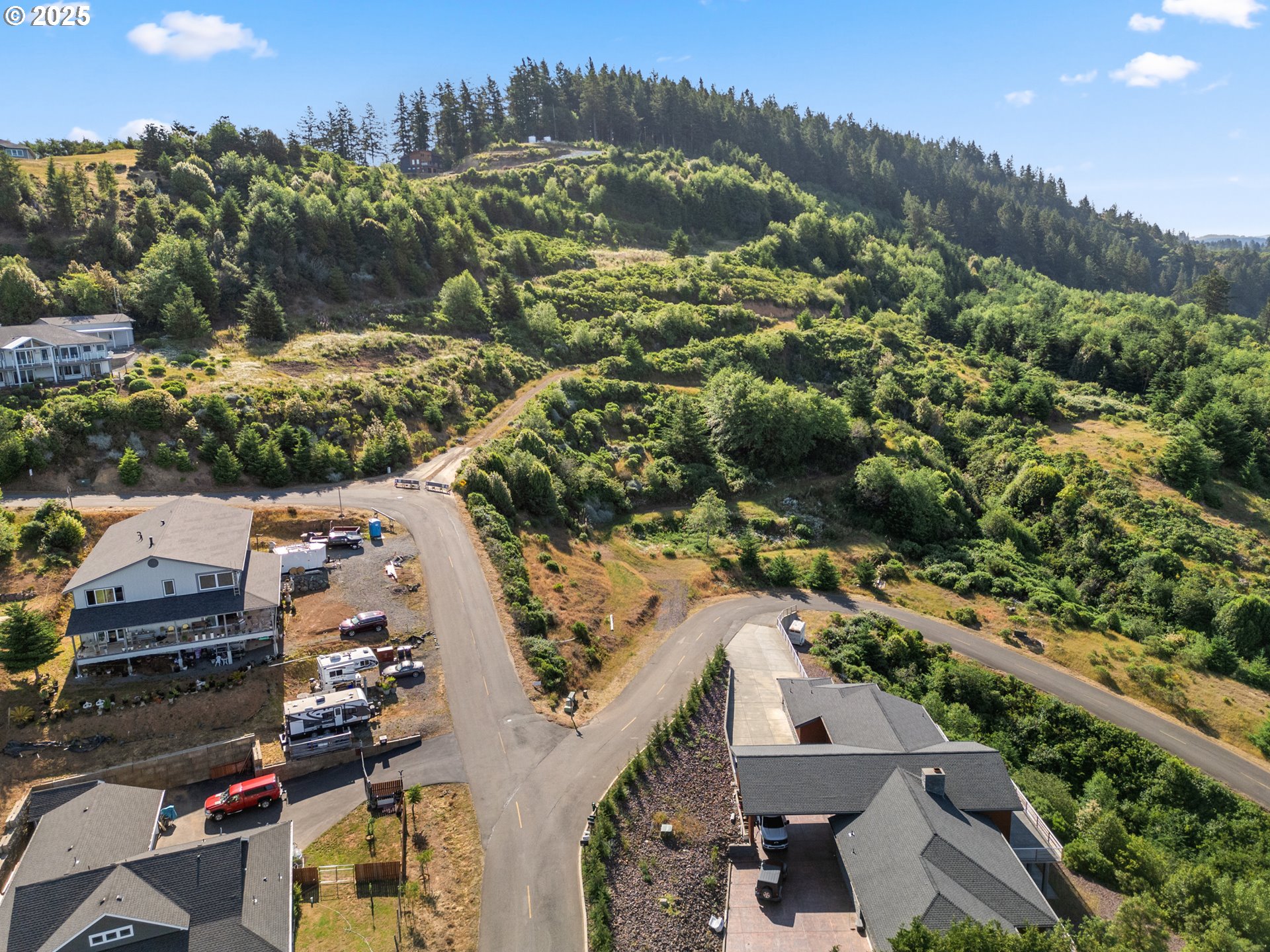 Crown Terrace Loop, Unit 2 Brookings, OR 97415 - Photo 7 of 23 an aerial view of a city
