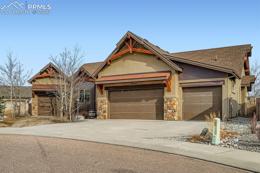 10625 Slumber Ridge Way Colorado Springs, CO 80908 - Photo 3 of 36 4 car garage!!