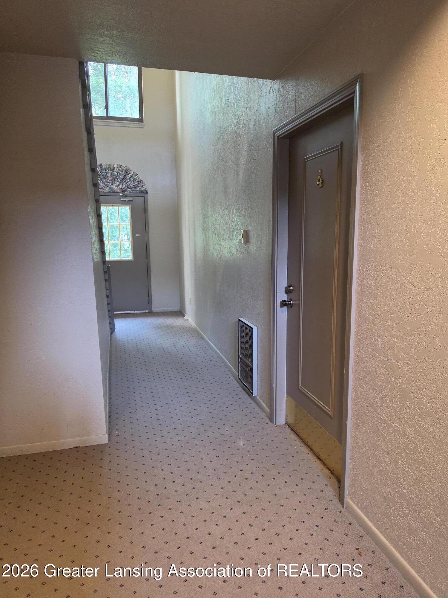 1715 Maple Ridge Road, Unit 4 Haslett, MI 48840 - Photo 4 of 22 20260629_172431