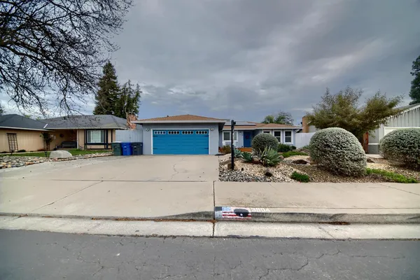 front view of a house with a street