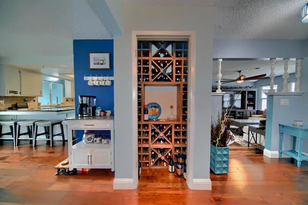 a kitchen with stainless steel appliances a refrigerator and a stove top oven