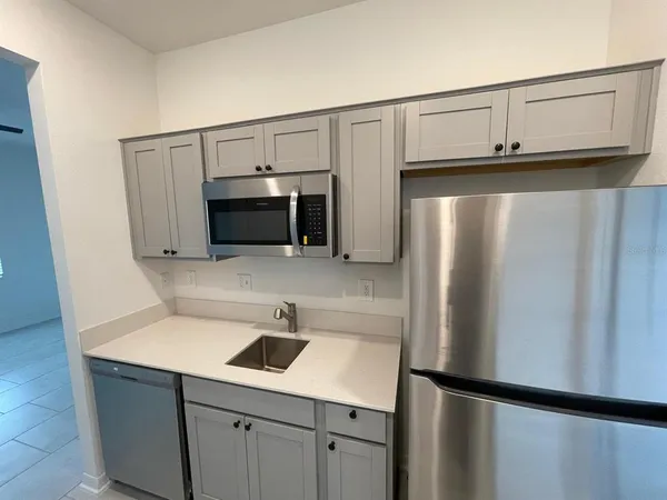 a utility room with washer and dryer