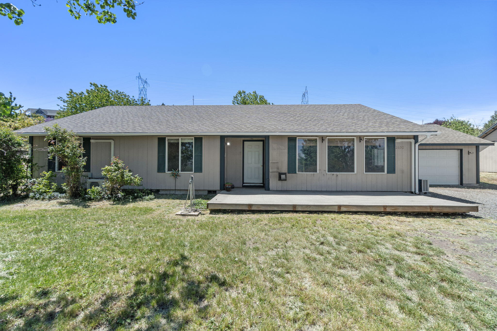 2630 Frontage Road Klamath Falls, OR 97601 - Photo 5 of 72 a front view of a house with a garden