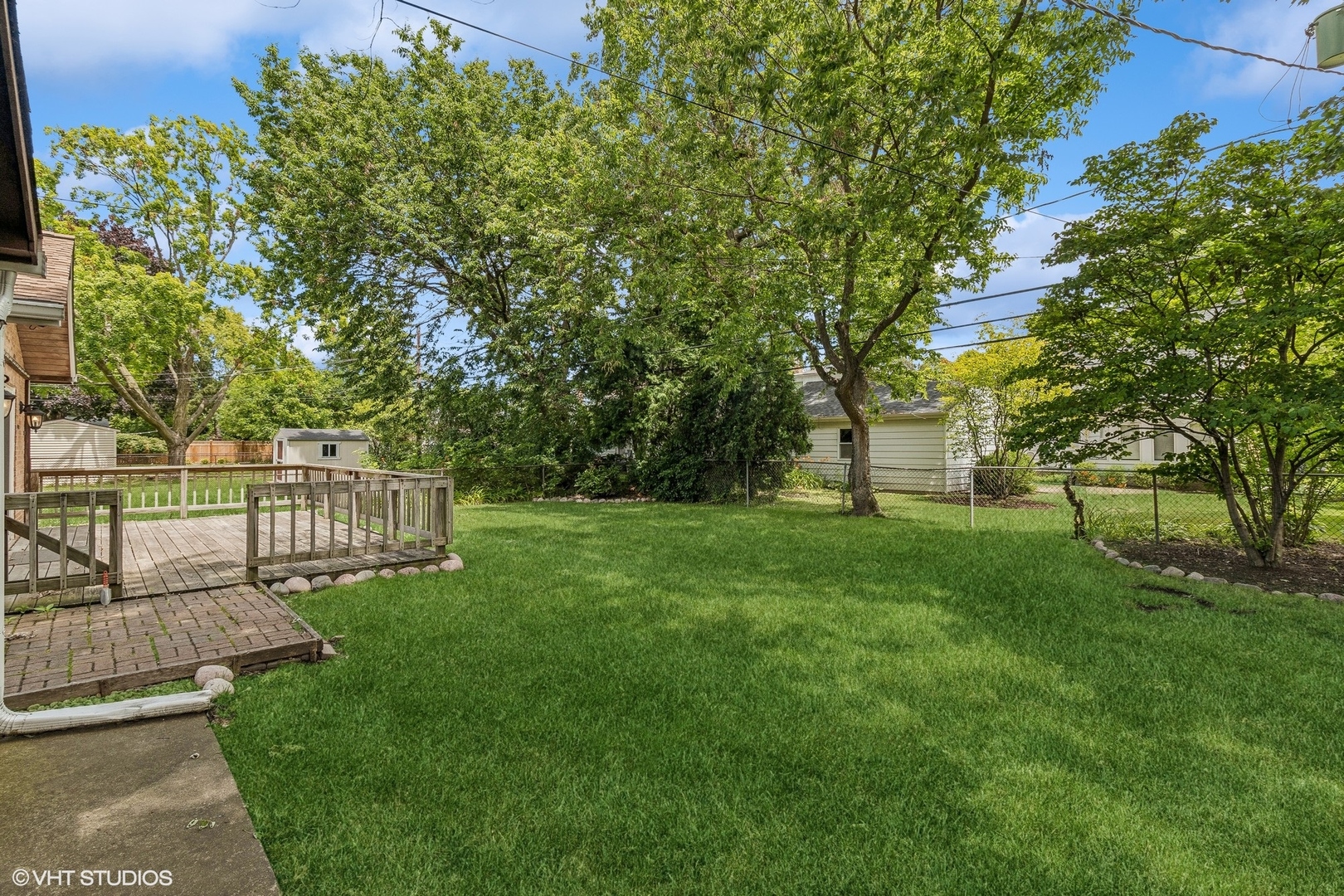 405 North Pine Street Mount Prospect, IL 60056 - Photo 17 of 22 a view of a house with a backyard