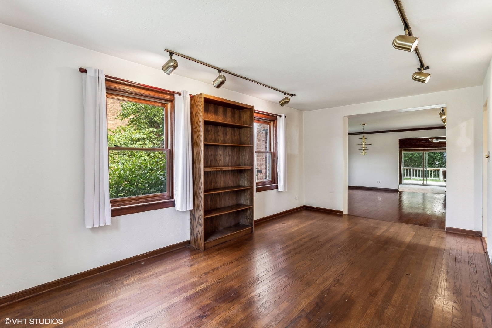 405 North Pine Street Mount Prospect, IL 60056 - Photo 2 of 22 an empty room with wooden floor closet and windows
