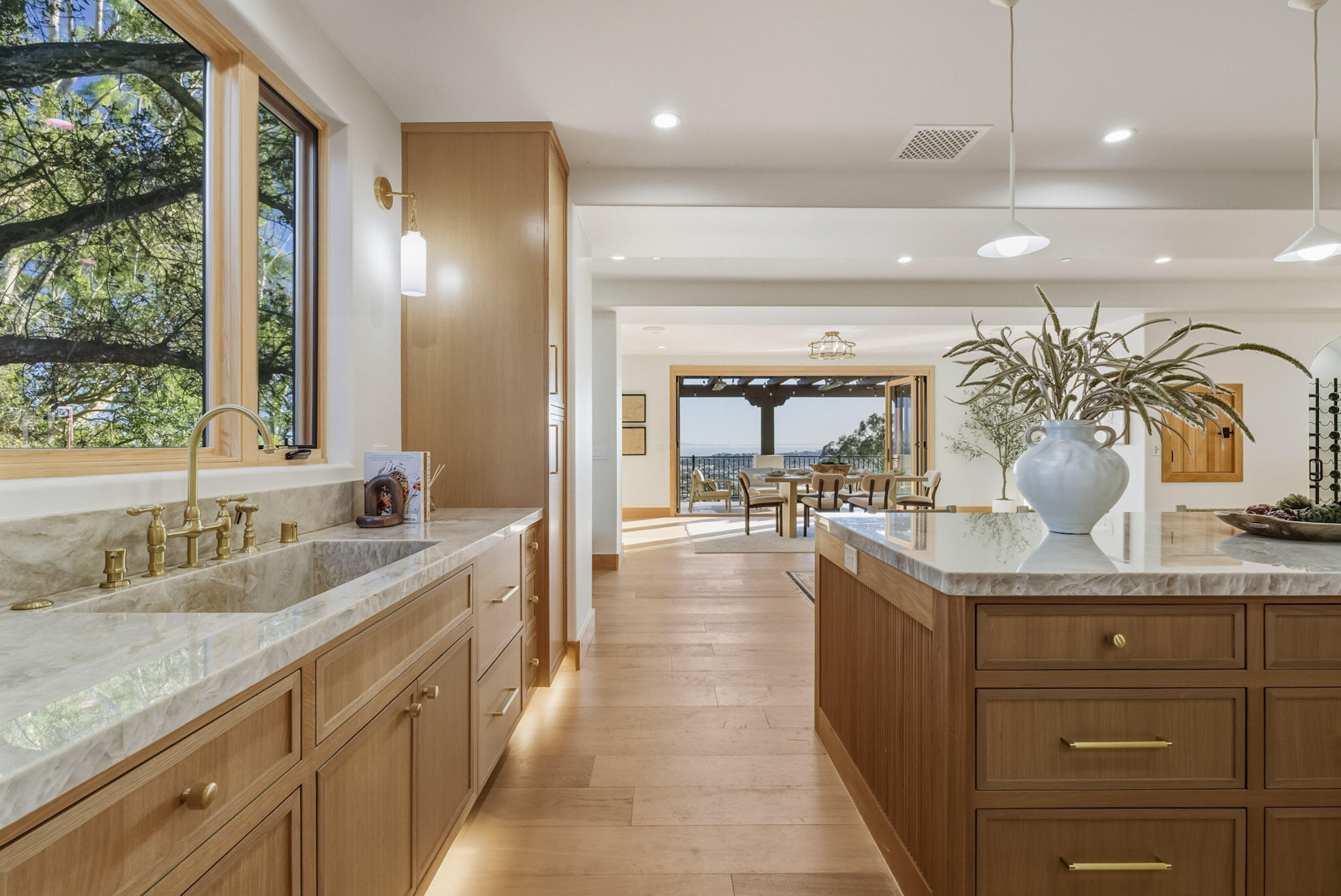 210 Las Alturas Road Santa Barbara, CA 93103 - Photo 17 of 61 a spacious bathroom with a granite countertop sink a large mirror and shower