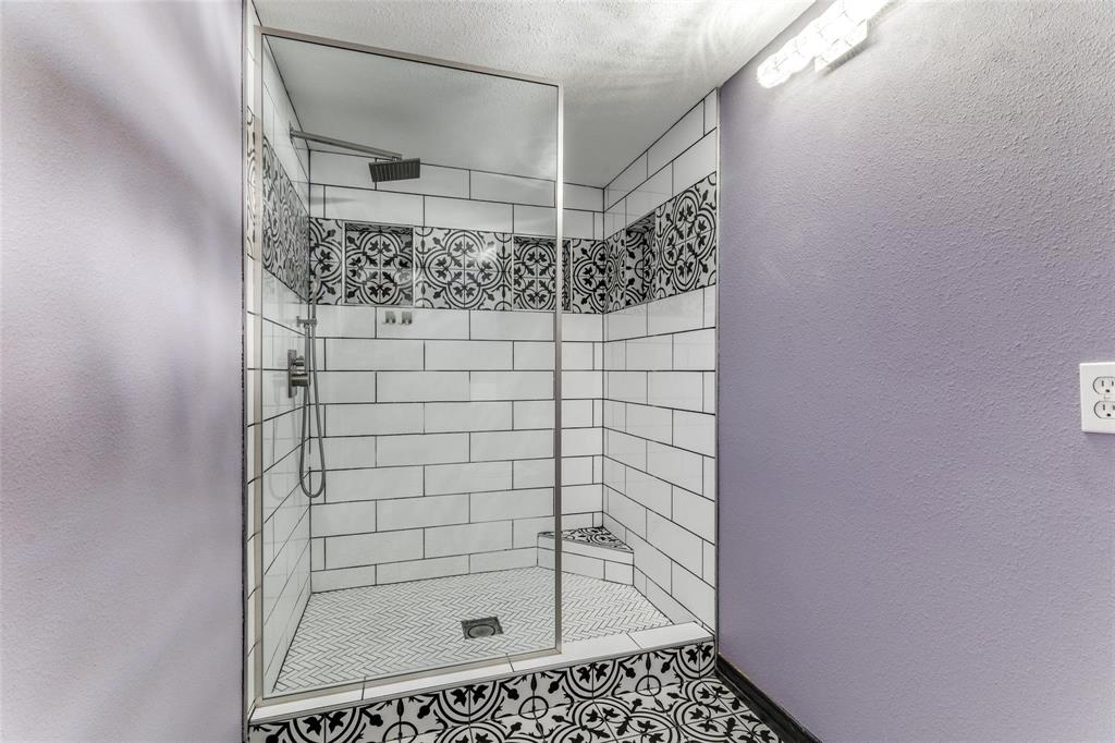 606 Ridgeline Drive Hurst, TX 76053 - Photo 10 of 29 a bathroom with a shower