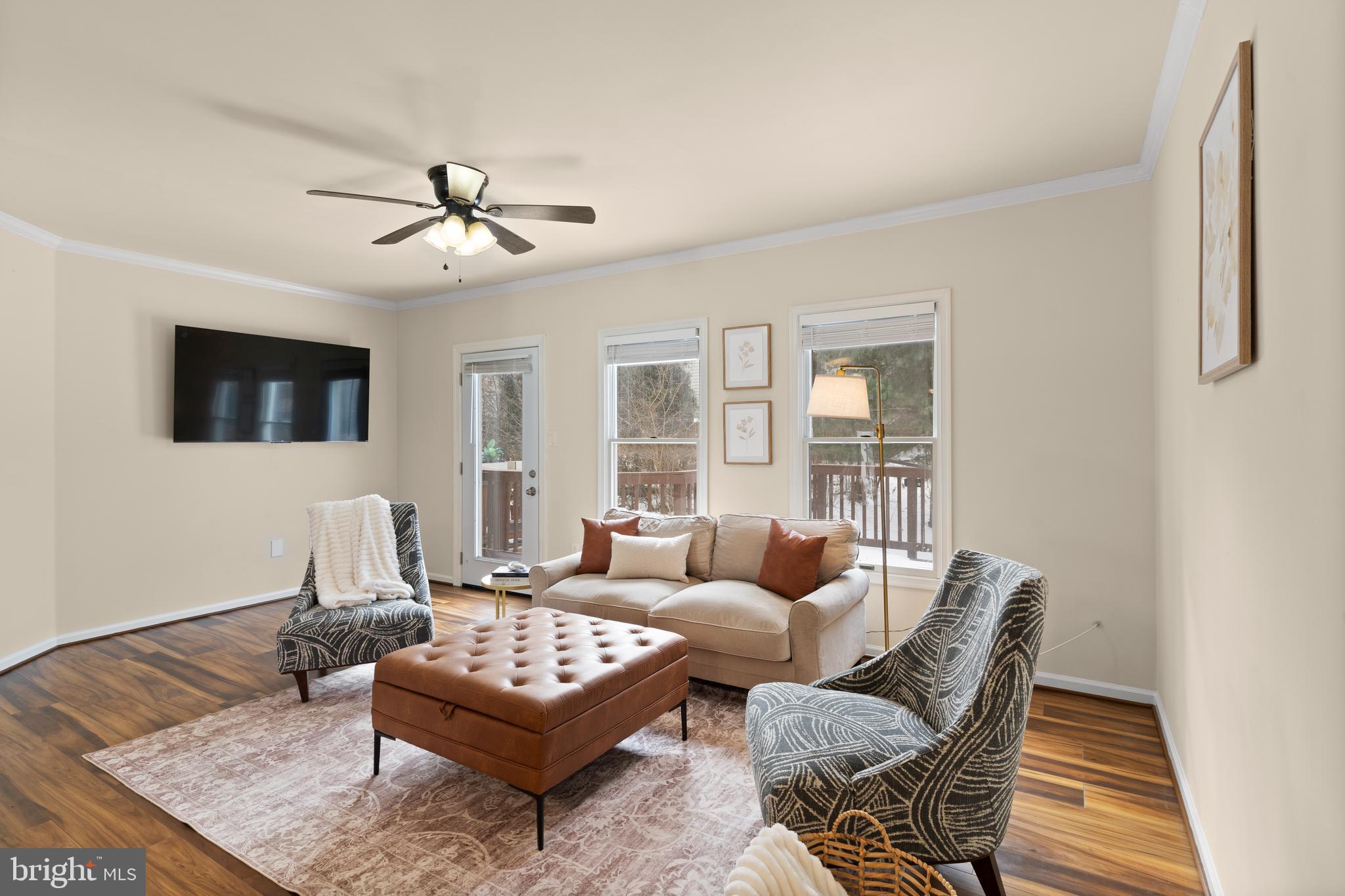 7823 Sabre Court Manassas, VA 20109 - Photo 14 of 39 a living room with furniture and a large window