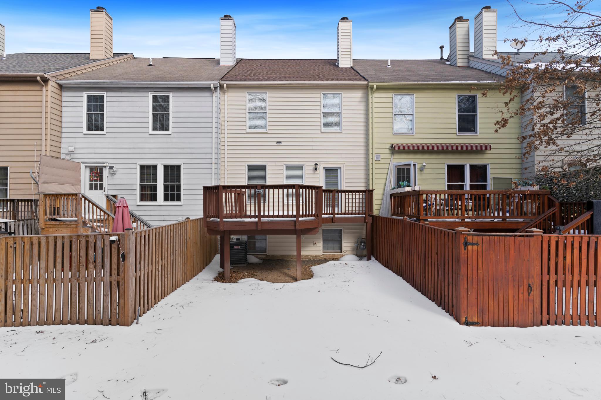 7823 Sabre Court Manassas, VA 20109 - Photo 39 of 39 a view of a house with wooden deck