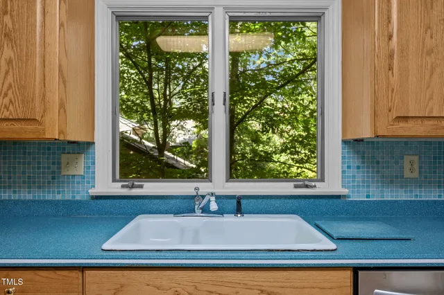 a kitchen with a stove and a microwave