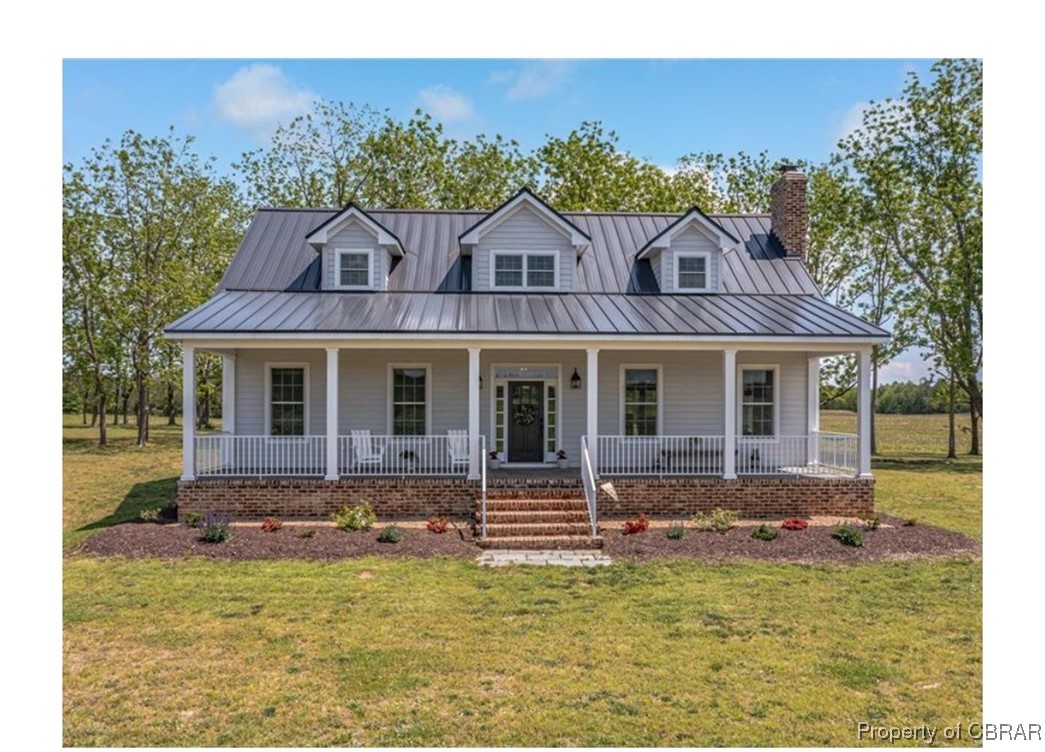 12013 Mary Ball Road Lancaster, VA 22503 - Photo 1 of 1 a front view of a house with a porch