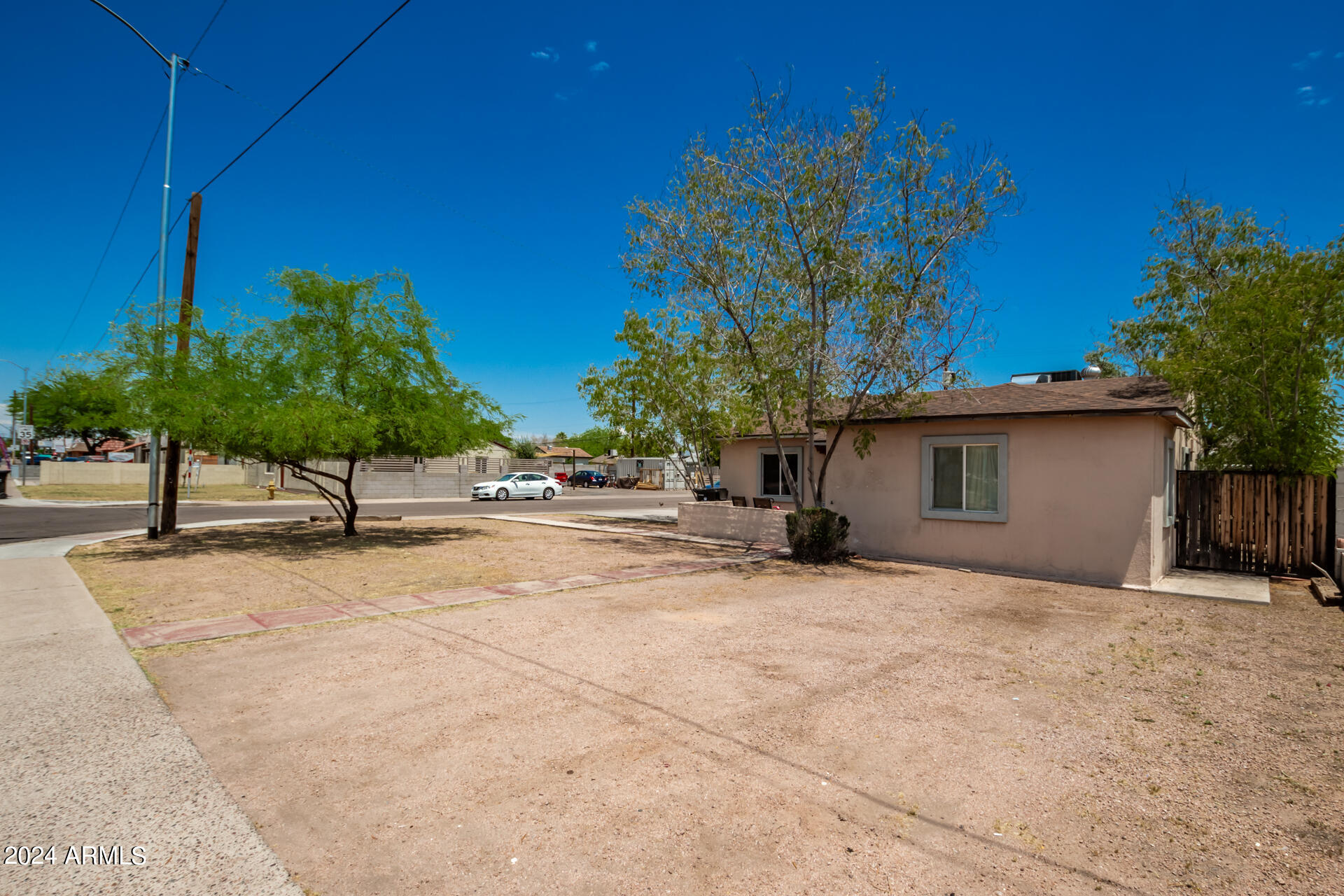 3845 North 15th Avenue Phoenix, AZ 85015 - Photo 20 of 28 a view of a house with a patio