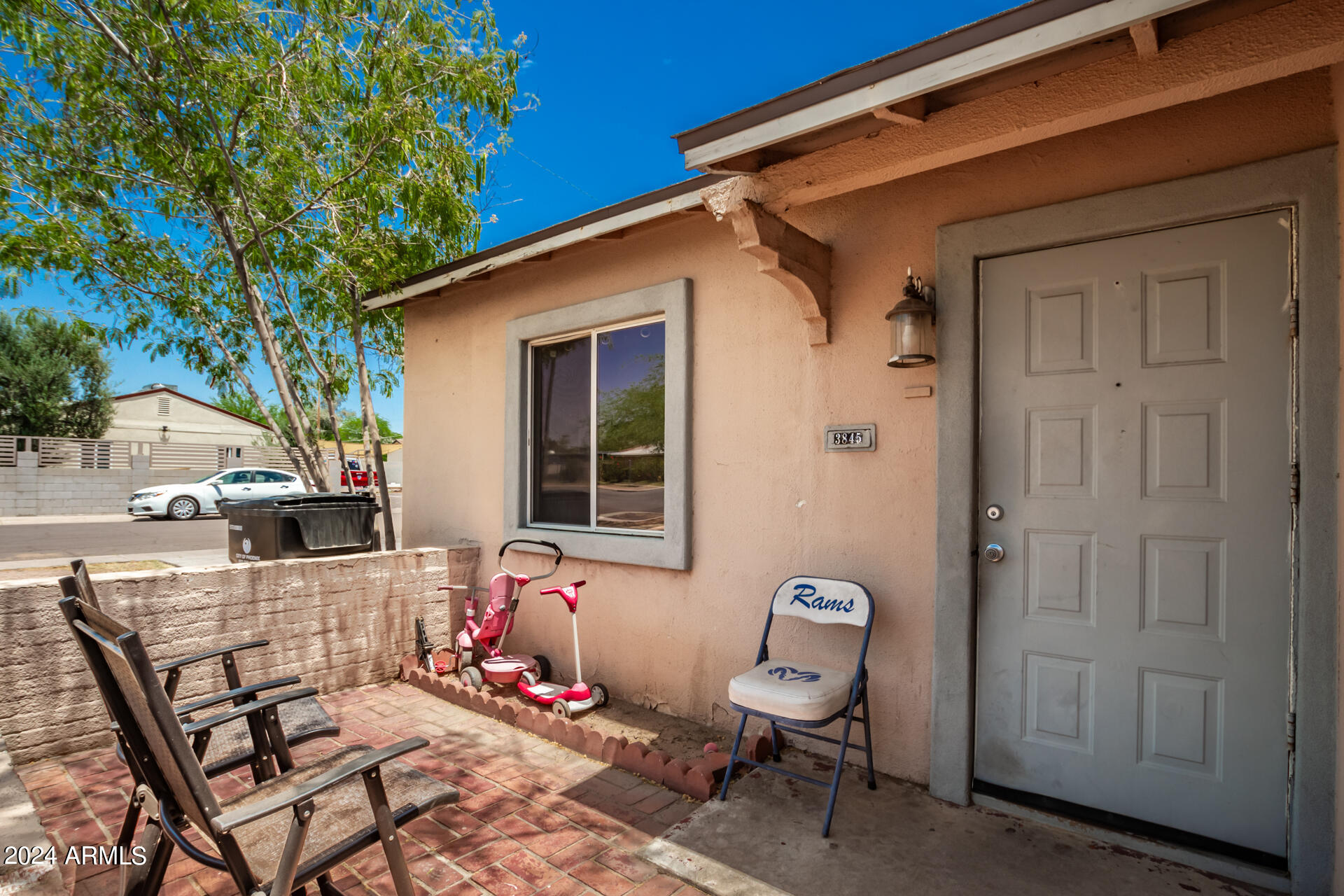 3845 North 15th Avenue Phoenix, AZ 85015 - Photo 23 of 28 a backyard of a house with table and chairs