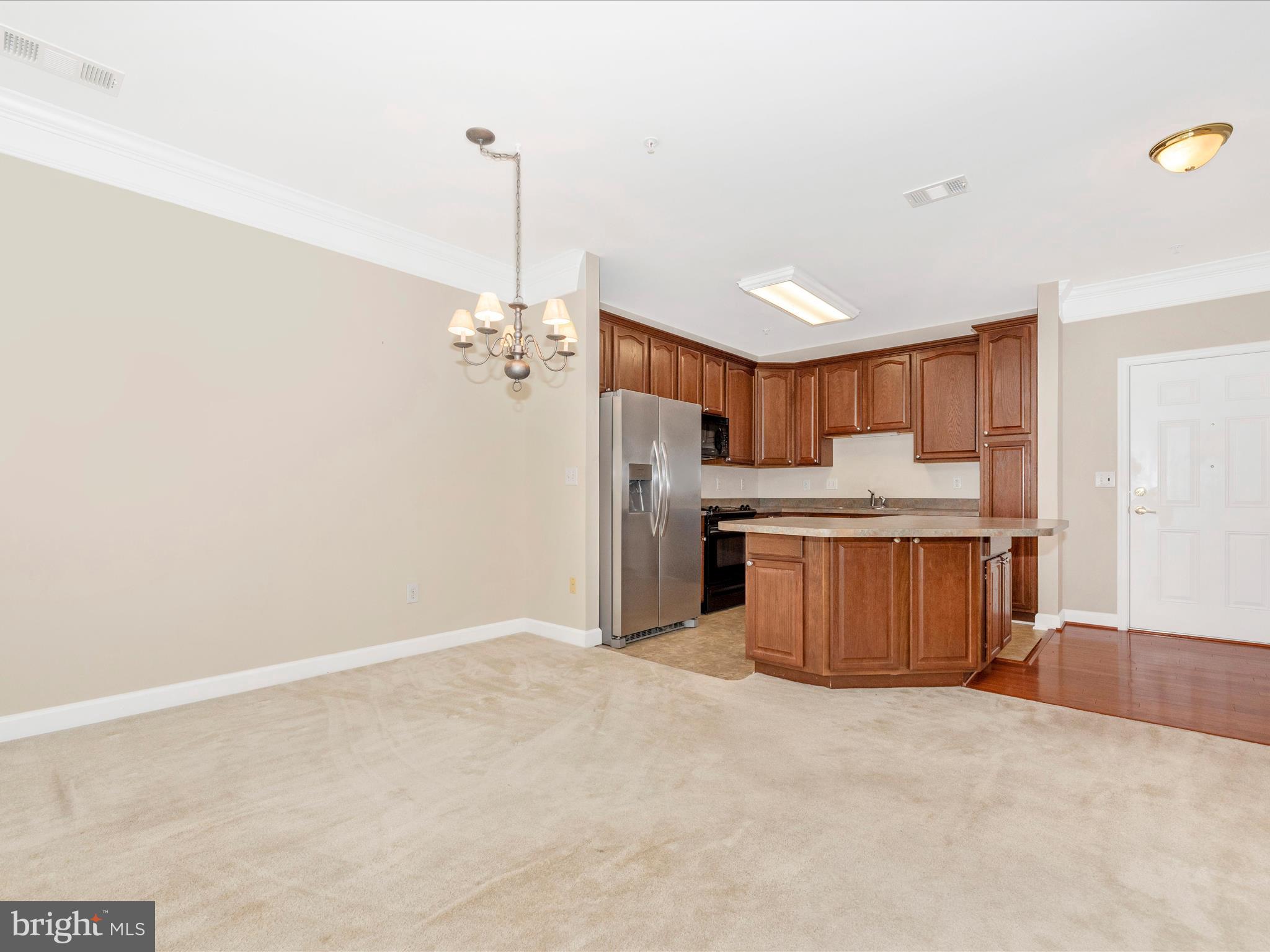 120 Burgess Hill Way, Unit 207 Frederick, MD 21702 - Photo 12 of 67 a view of a kitchen with a sink