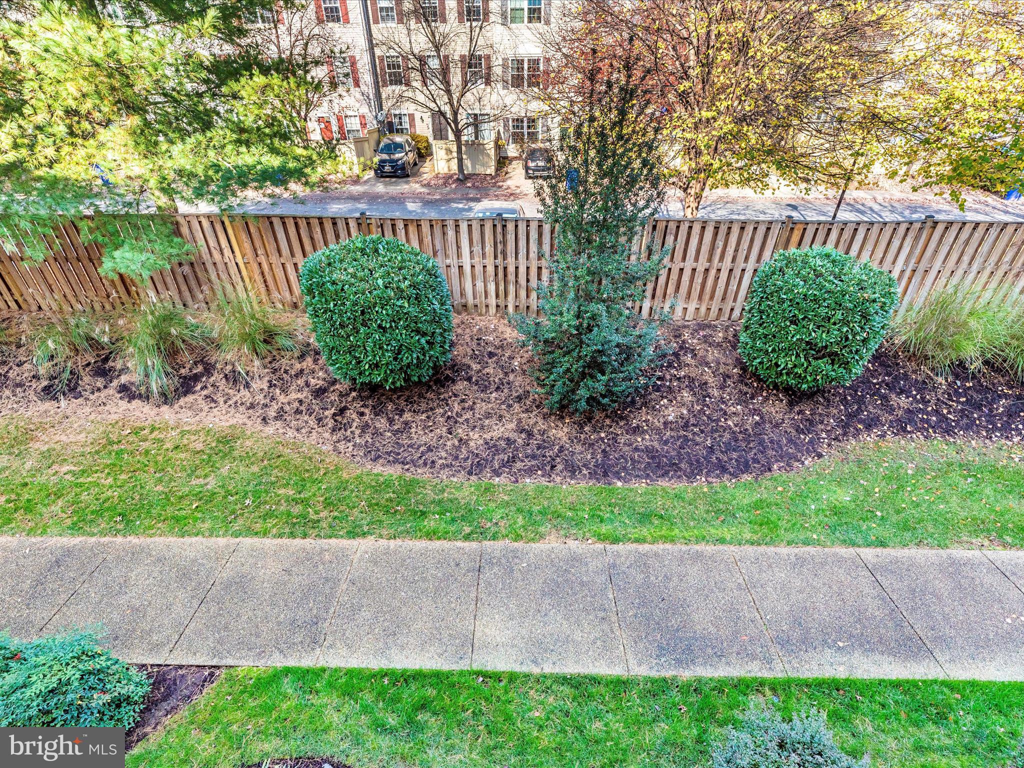 120 Burgess Hill Way, Unit 207 Frederick, MD 21702 - Photo 45 of 67 a green field with plants in front of it