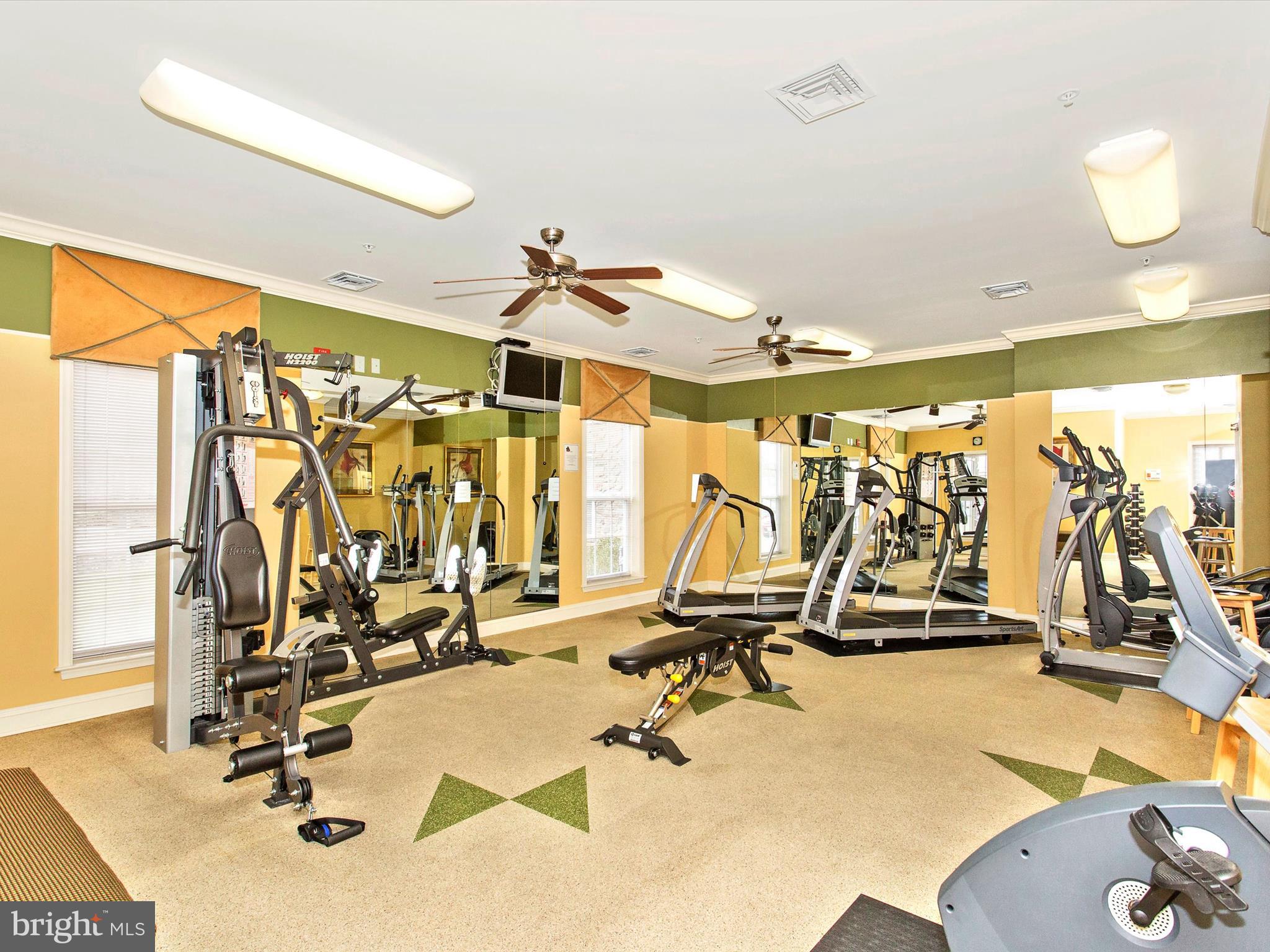 120 Burgess Hill Way, Unit 207 Frederick, MD 21702 - Photo 54 of 67 a view of a room with gym equipment