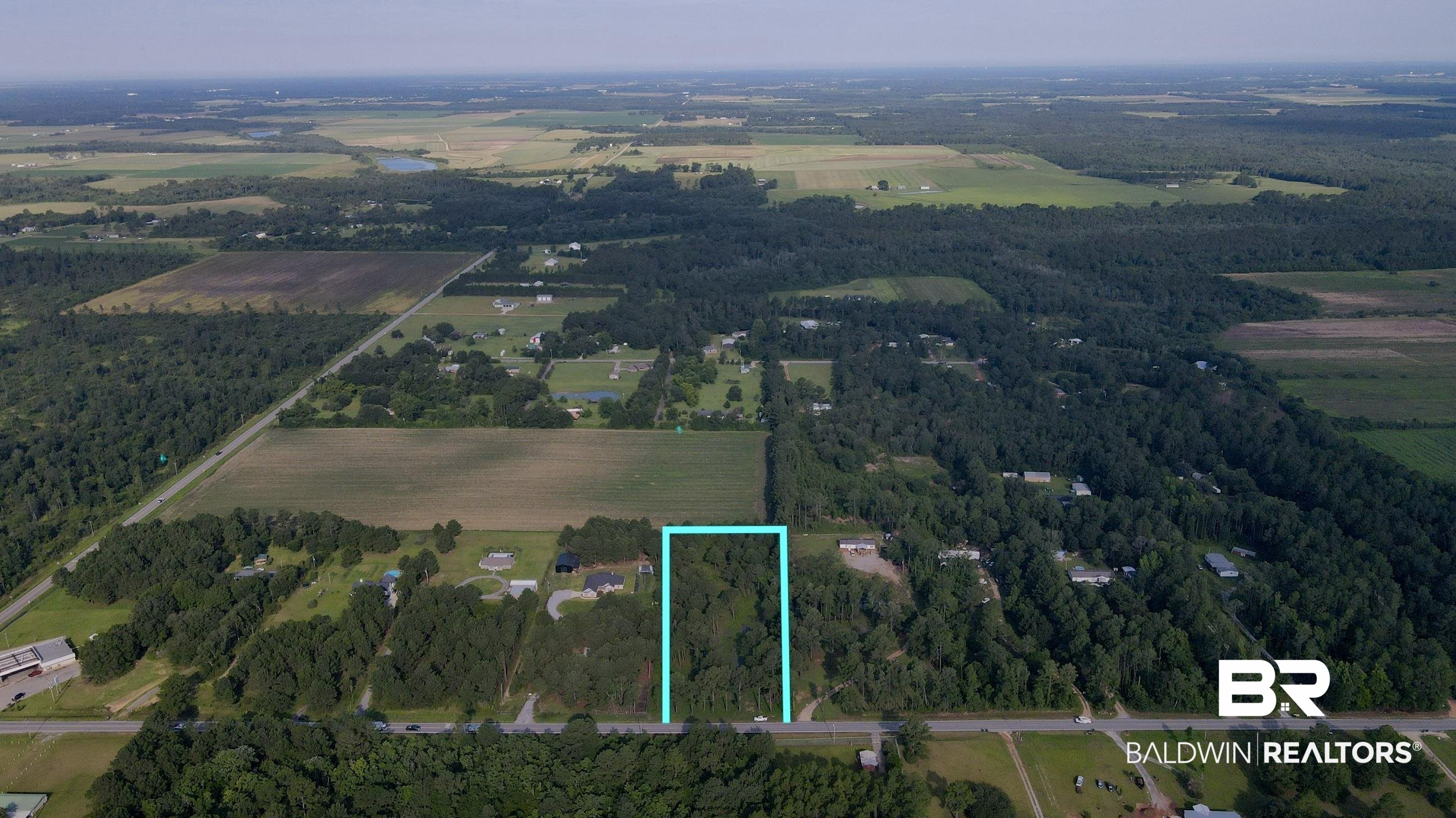 17239 County Road 87 Elberta, AL 36530 - Photo 2 of 5 Aerial view of property's location featuring rural landscape, property parcel outlined, and large plots for crops
