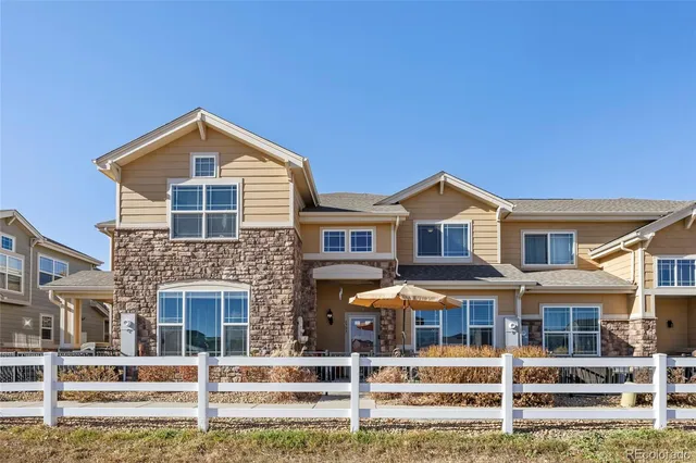 a front view of a house with glass windows
