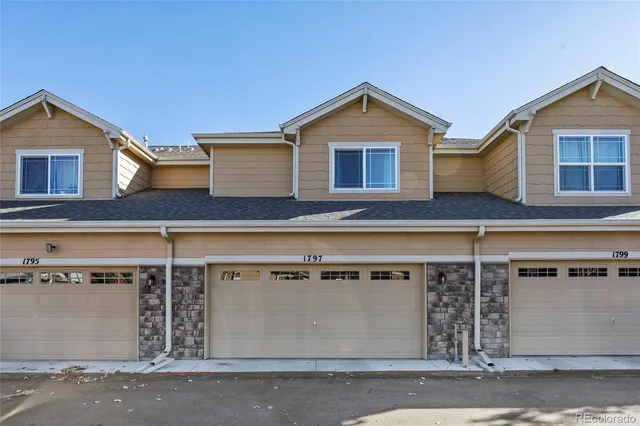 a view of a house with a garage